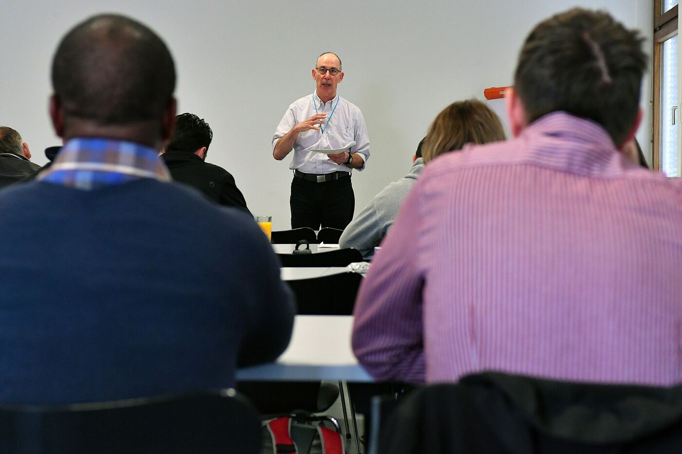 An instructor leading a classroom theory session