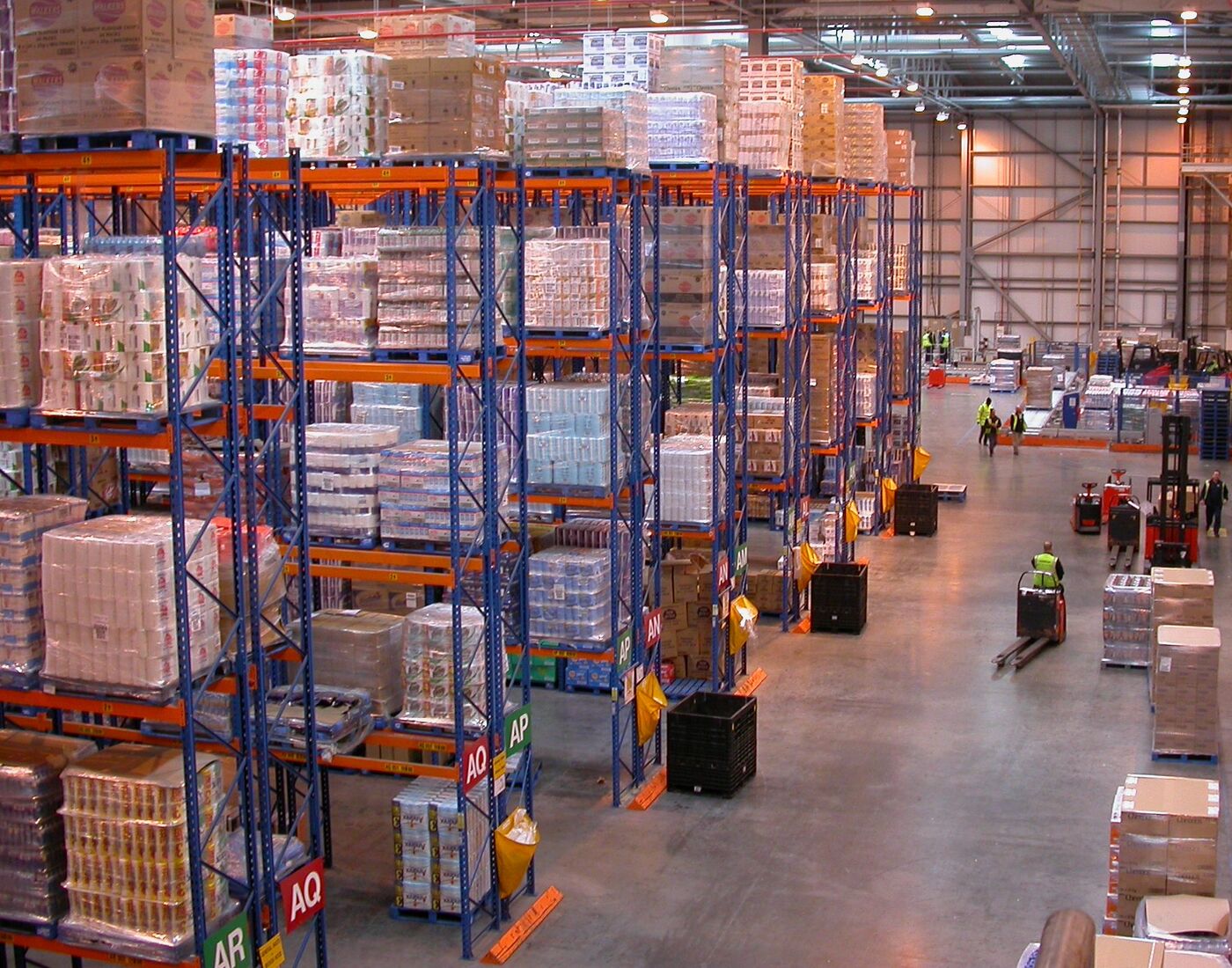 A large distribution centre with racking and forklift traffic