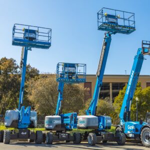 blue aerial lift and forklift trucks