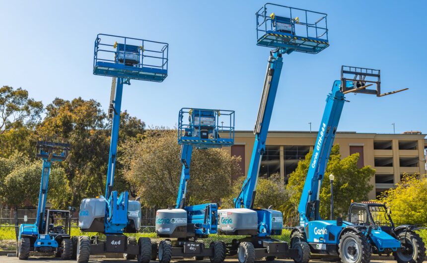 blue aerial lift and forklift trucks