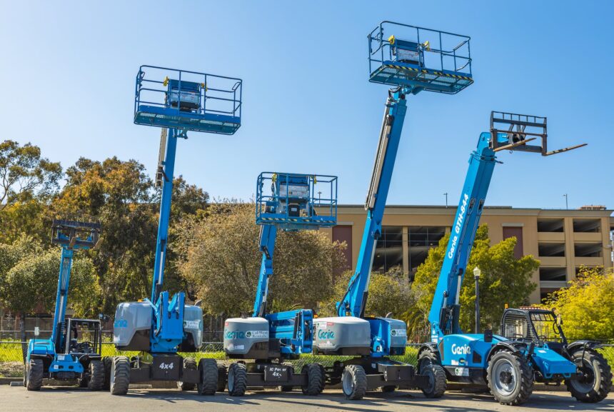 blue aerial lift and forklift trucks