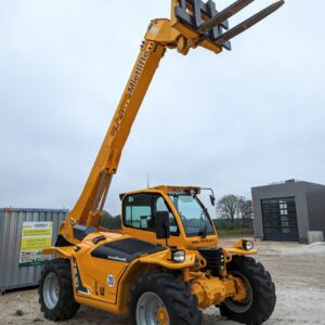 a large yellow forklift with a crane attached to it