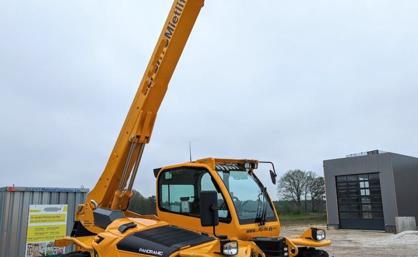 a large yellow forklift with a crane attached to it