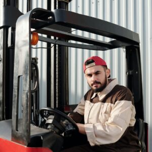 operator sitting inside forklift