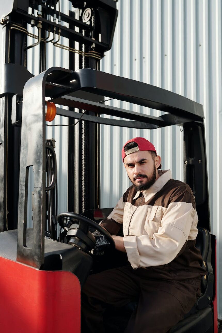 operator sitting inside forklift