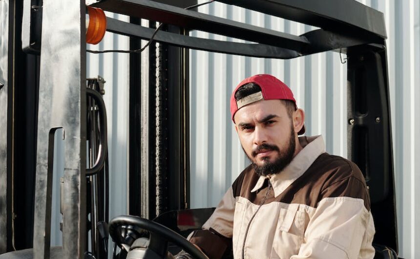 operator sitting inside forklift