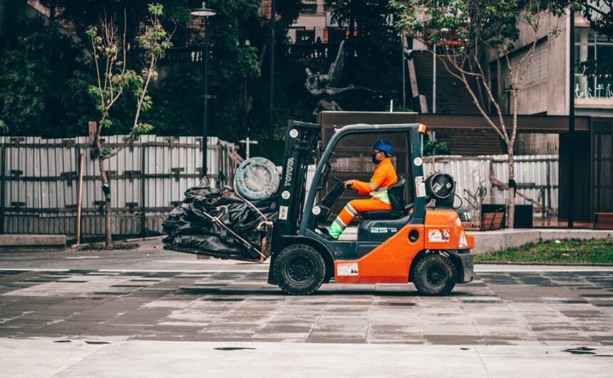 man driving truck on asphalt road