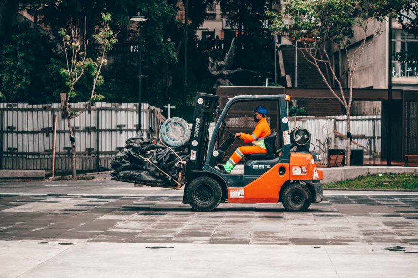 man driving truck on asphalt road